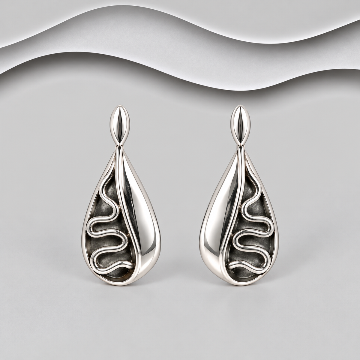 925 Sterling Silver Hand crafted Sculptured Teardrop Wave Earrings