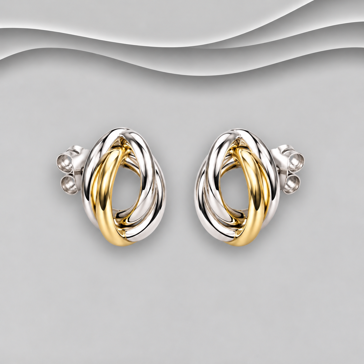 Two-tone 925 sterling silver knot stud earrings with three interwoven strands and a yellow gold centre strand