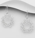 A delicately sculpted silver flower forms the heart of this design rafted In 925 Sterling Silver