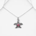 Sterling Silver Starfish Pendant with Ruby Red CZ