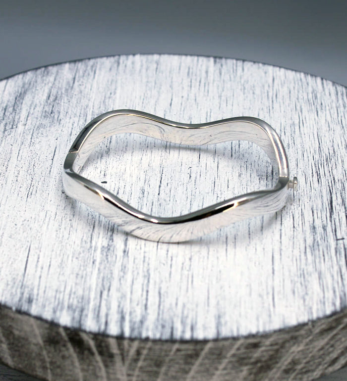 Solid 925 Sterling Sterling Silver Wavey Bangle Secured with a Safety Catch. Exclusive